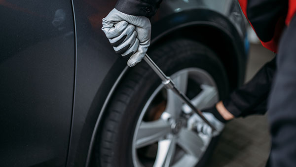 changing car tyre diesel electric
